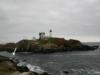 Nubble Light House, Cape Neddick -  Nubble from rightside, can swim through channel, seas are usually rougher on right side