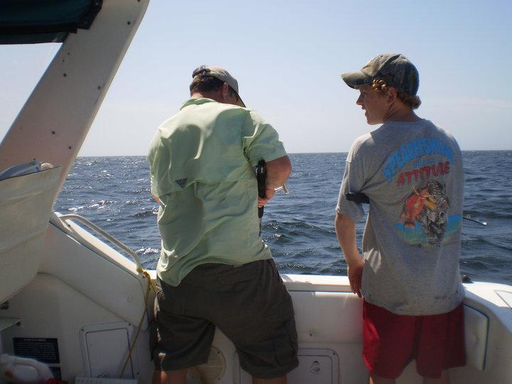 James and I fishing from our boat