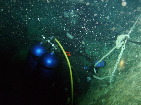 Following the tie down rope to the bottom of Blue Grotto