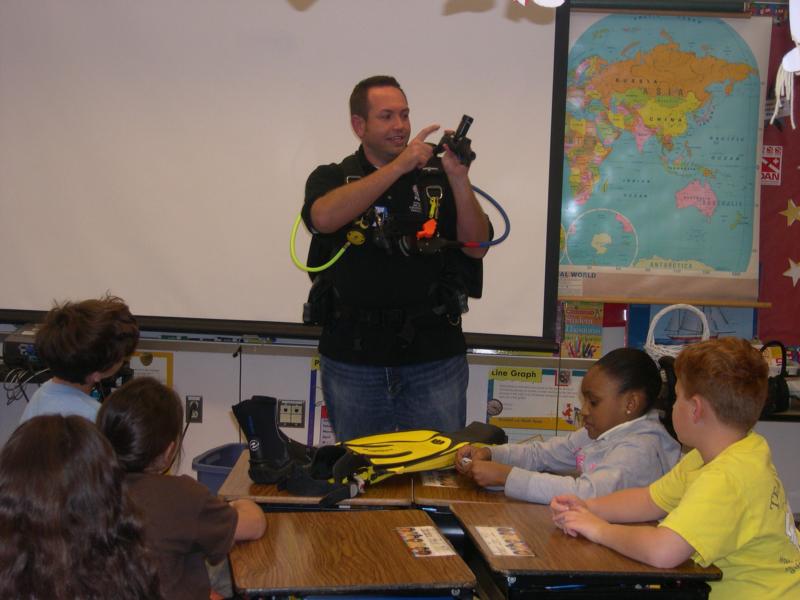 Invited to a school to teach students about scuba